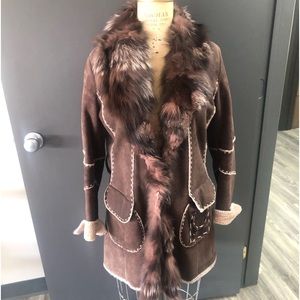 Ladies genuine shearling fox trim coat 31” back length.    Across waist 37”